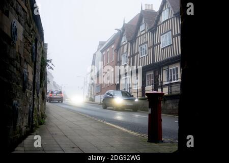 High Street seen from Westgate arch on a foggy winter`s day, Warwick, UK Stock Photo